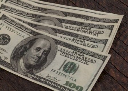 D&oacute;lar fecha a R$ 5,22 com queda de 0,64% e bolsa sobe com foco externo